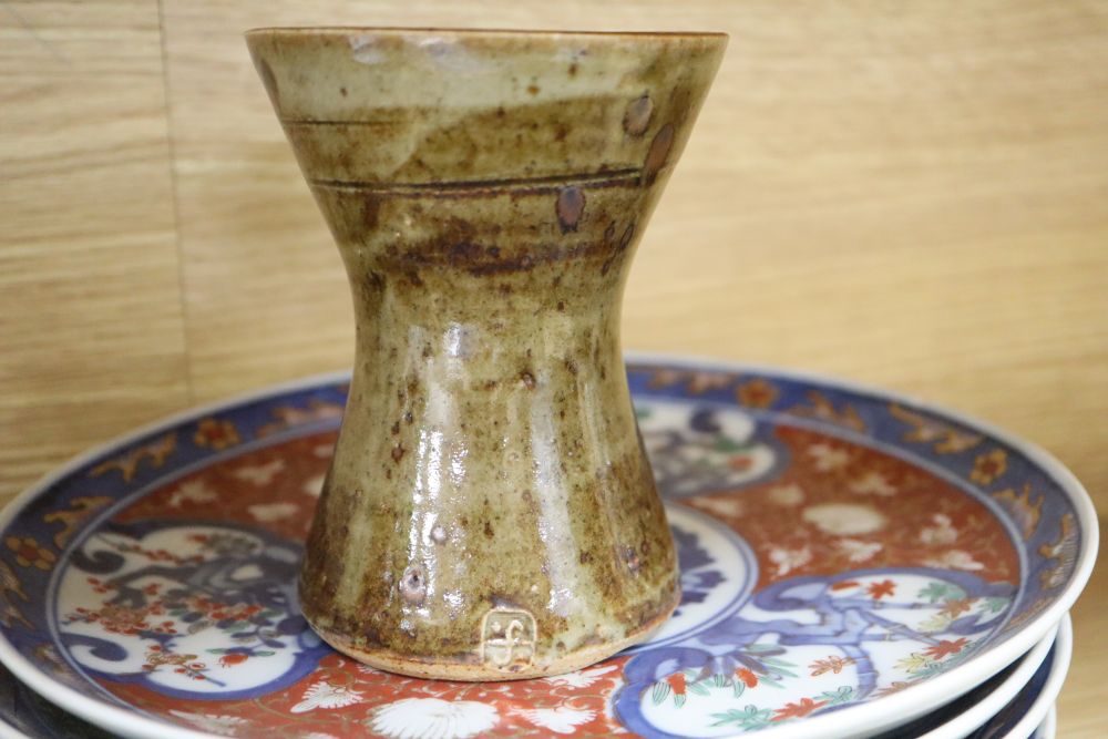 A group of Japanese Imari dishes and bowls, and a St Ives pottery vase